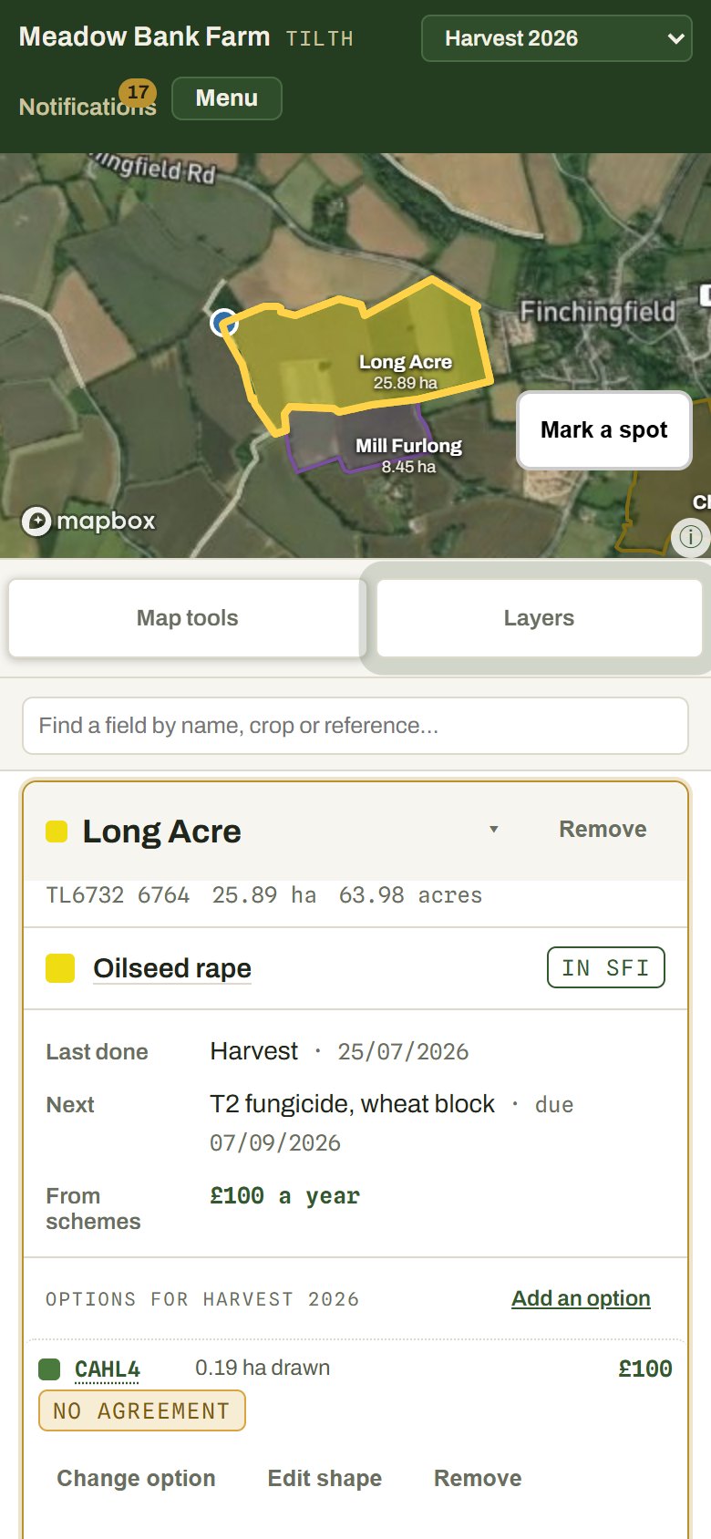 The map on a phone: a field outlined over satellite imagery with its card open underneath.